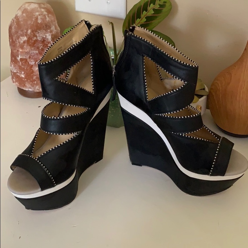 Black and white wedged heels